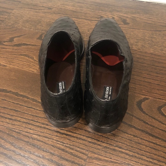 Black ostrich leather loafers. Made in Italy.